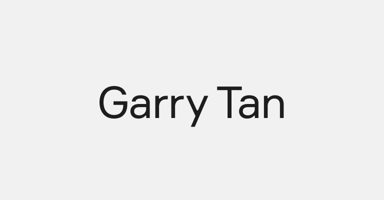 The name 'Garry Tan' displayed in bold, modern typography on a plain gray background.