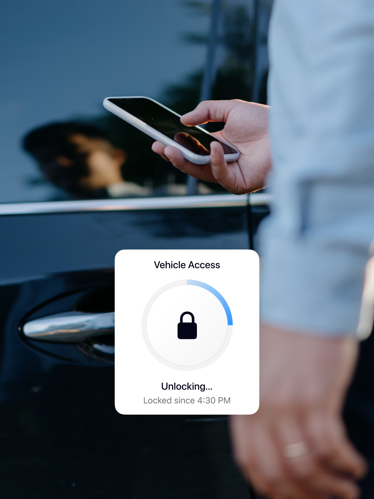 A person holding a smartphone near a car door, with a digital display showing 'Unlocking...' and a locked icon. The car's surface reflects sunlight.